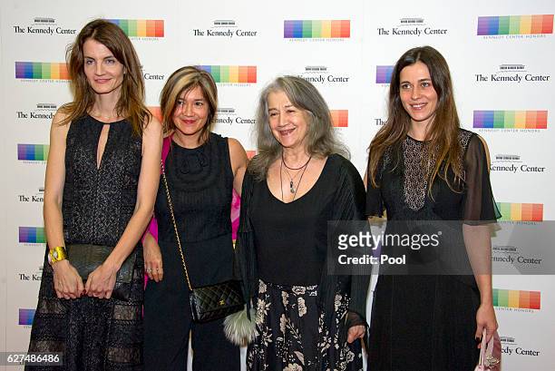 Argentine pianist Martha Argerich, center right, arrives with her daughters, from left, Anne Catherine Dutoit, Lyda Chen,Stephanie Argerich. For the...