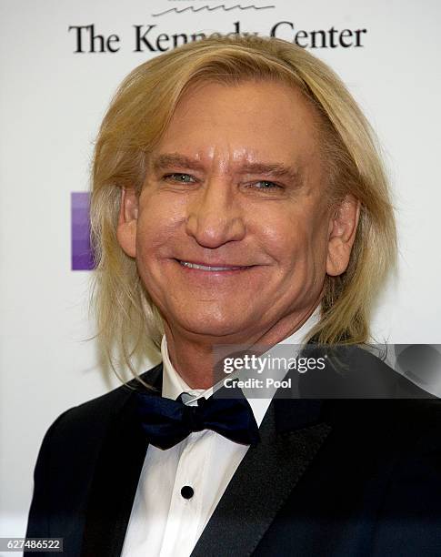 Joe Walsh of the rock band "The Eagles" arrives for the formal Artist's Dinner honoring the recipients of the 39th Annual Kennedy Center Honors...