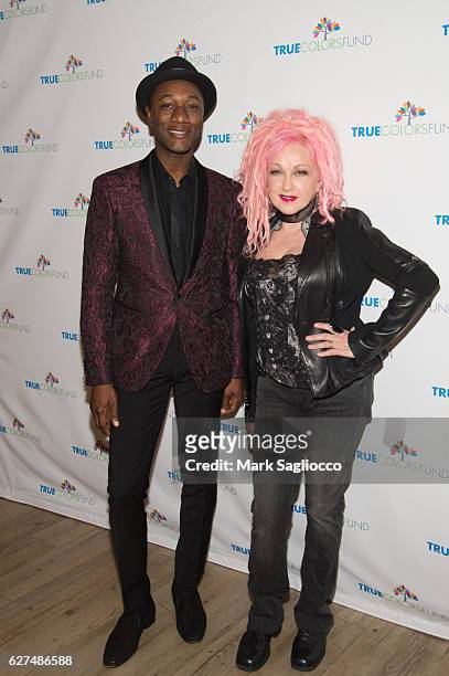 Musical artists Aloe Blacc and Cyndi Lauper attend the True Colors Fund 6th Annual Home For The Holidays Concert at Beacon Theatre on December 3,...