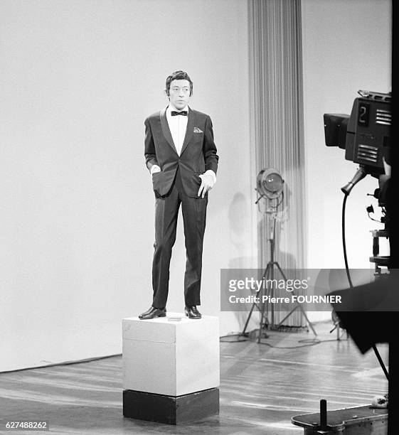 French singer Serge Gainsbourg on television set.