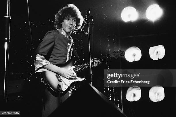 Rob Davis of English glam rock band Mud performs on stage in Leicester, United Kingdom, 1976.