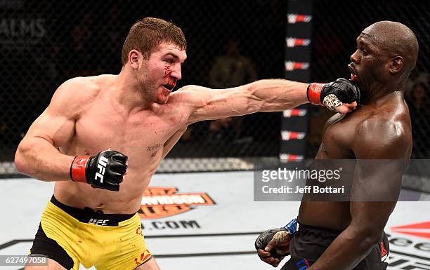 Ion Cutelaba of Moldova punches Jared Cannonier in their light heavyweight bout during The Ultimate Fighter Finale event inside the Pearl concert...