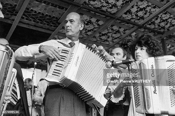 French Finance minister, Valery Giscard D'Estaing plays accordion at the Second World Accordion Festival in Montmorency. After being invited as a...