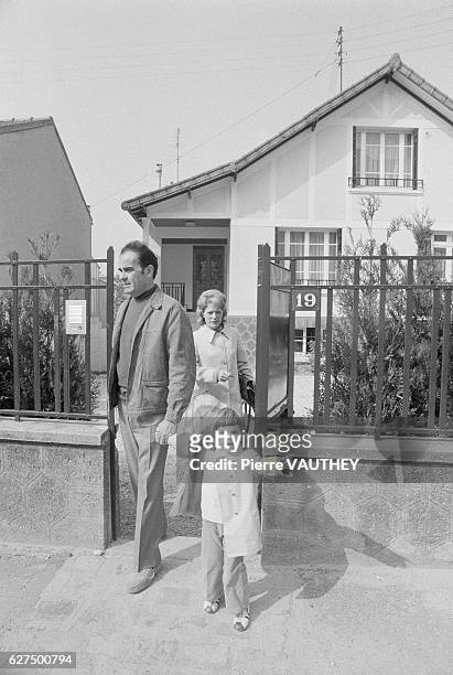 Georges Marchais, Secretary General of the French Communist Party, leaves his house in Champigny-sur-Marne, France, with his daughter and wife,...