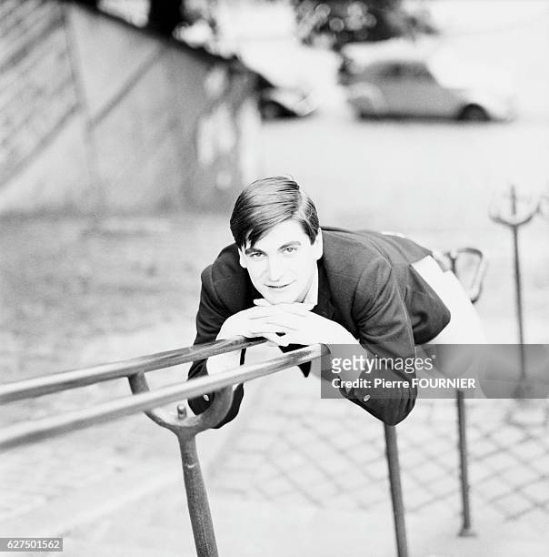 French Singer Serge Lama on Stair Rail, May 1965.