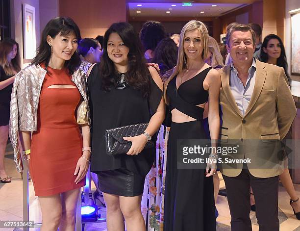 Jung Hwa Shin, Susan Shin and Isabelle Dominguez De Haro and Tony Dominguez de Haro attend Underwater Dreams To Life In Color - Art Exhibit Featuring...