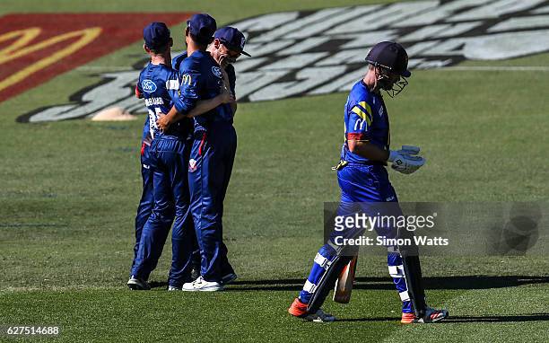 Auckland players celebrate a wicket during the McDonalds Super Smash T20 match between the Auckland Aces and Otago Volts at Eden Park on December 4,...