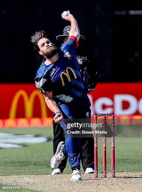 Mitchell McClenaghan of Auckland bowls during the McDonalds Super Smash T20 match between the Auckland Aces and Otago Volts at Eden Park on December...