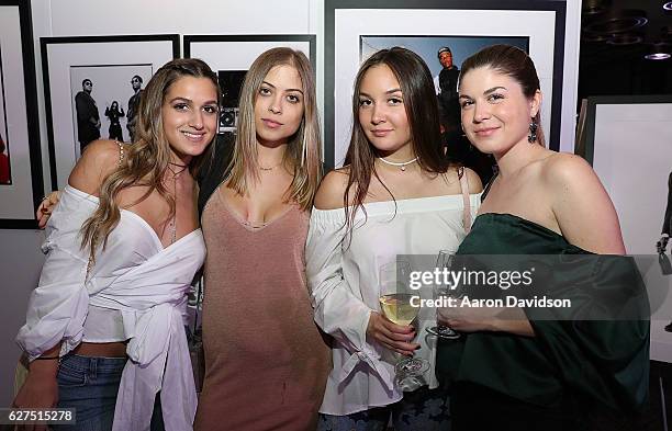 Natalia Gomez, Gaby Beyer, Lauren Munilla, and Navila Machado attends An Evening Of Hip Hop With A Performance By Darryl "DMC" McDaniels on December...