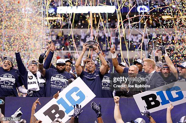 Head Coach James Franklin and the Penn State Nittany Lions celebrate after beating the Wisconsin Badgers 38-31 in the Big Ten Championship at Lucas...