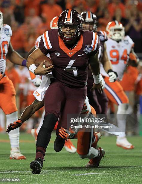 Jerod Evans of the Virginia Tech Hokies rushes during the ACC Championship against the Clemson Tigers on December 3, 2016 in Orlando, Florida.