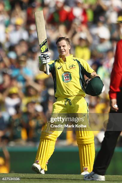 Steven Smith of Australia celebrates his century during game one of the One Day International series between Australia and New Zealand at Sydney...