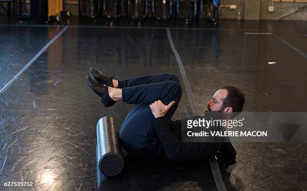 French dancer and choreographer Benjamin Millepied warms up on December 1, 2016 at The Los Angeles Theater Center in Los Angeles, California. French...