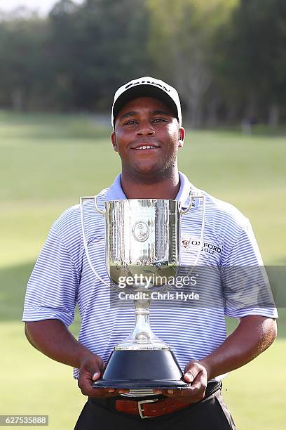 Harold Varner III of the USA celebrates after winning the Joe Kirkwood trophy on day four of the 2016 Australian PGA Championship at RACV Royal Pines...