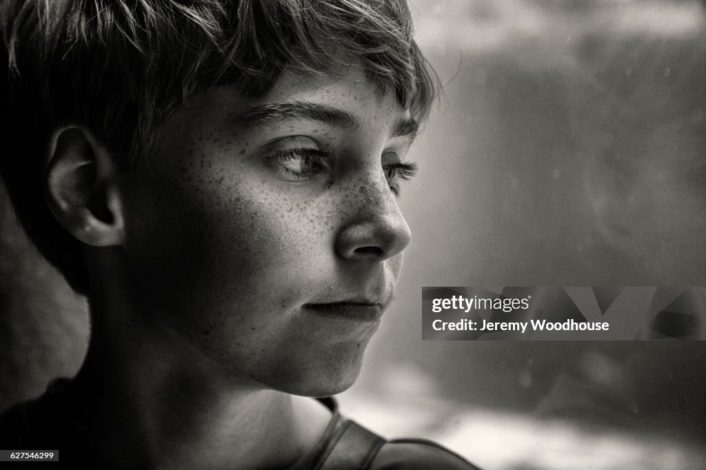 Close up of face of serious Caucasian boy