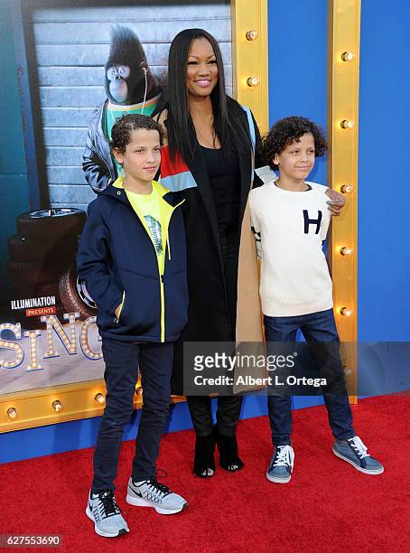 Actress Garcelle Beauvais and sons Jaid Thomas Nilon and Jax Joseph Nilon arrive at the Premiere Of Universal Pictures' "Sing" held at Microsoft...