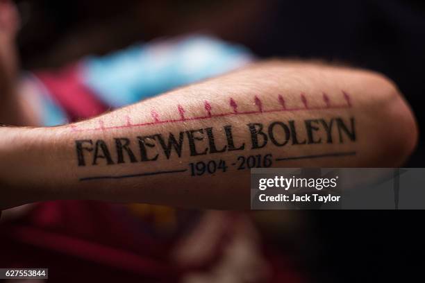 Tattoo which says 'Farewell Boleyn 1904-2016' is pictured on Darren Powers' arm at the Boleyn Pub in Upton Park on December 3, 2016 in London,...