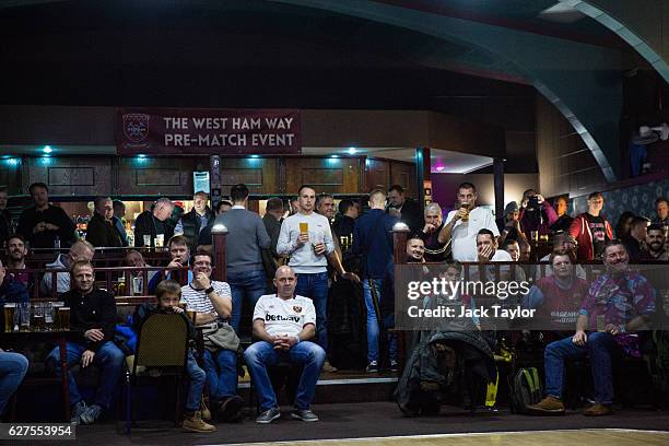 West Ham United Football Club fans attend a pre-match event at the East Ham Working Men's Club in Upton Park on December 3, 2016 in London, England....