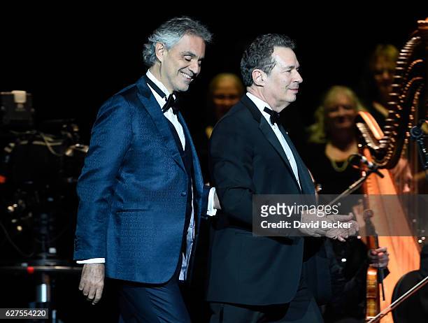 Singer Andrea Bocelli is escorted on stage by conductor Eugene Kohn prior to Bocelli's performance at MGM Grand Garden Arena as he kicks off his U.S....