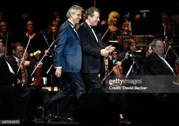 Singer Andrea Bocelli is escorted on stage by conductor Eugene Kohn prior to Bocelli's performance at MGM Grand Garden Arena as he kicks off his U.S....