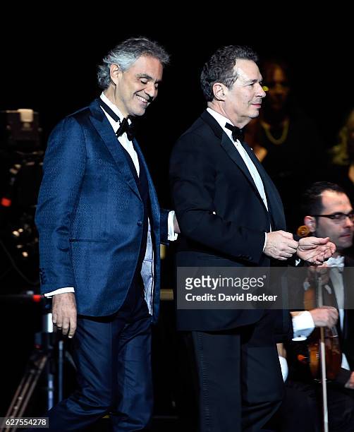Singer Andrea Bocelli is escorted on stage by conductor Eugene Kohn prior to Bocelli's performance at MGM Grand Garden Arena as he kicks off his U.S....