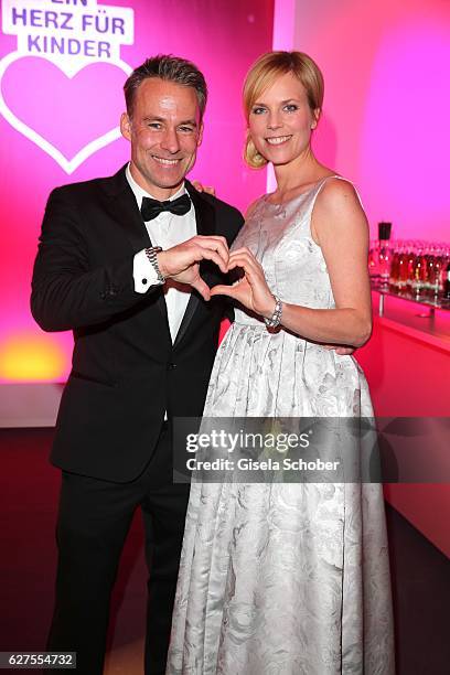 Marco Girnth and Melanie Marschke are seen during the Ein Herz Fuer Kinder reception at Adlershof Studio on December 3, 2016 in Berlin, Germany.