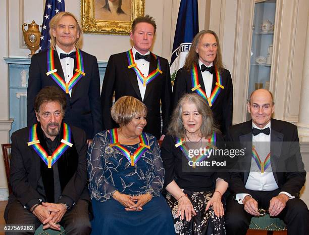 The recipients of the 39th Annual Kennedy Center Honors pose for a group photo following a dinner hosted by United States Secretary of State John...