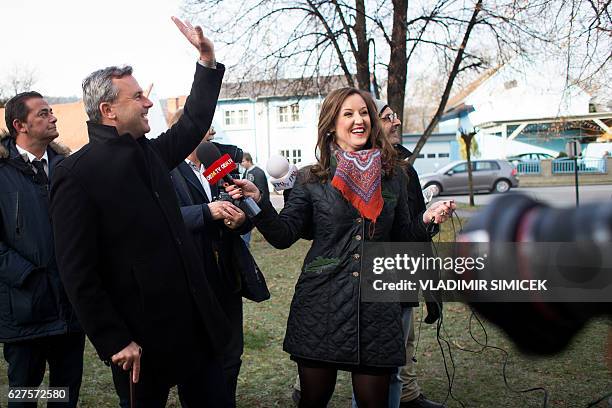Austrian right-wing Freedom Party presidential candidate Norbert Hofer waves as he arrives at a protestant church in Pinkafeld, Austria, on December...