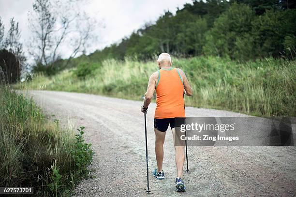 Senior man cross country walking