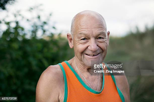 senior jogger, portrait - vest stock pictures, royalty-free photos & images