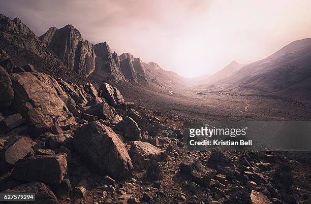 parched, rcky desert landscape in southern morocco - terreno accidentato foto e immagini stock