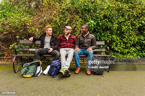 Group of Gay Men Talking in a Park