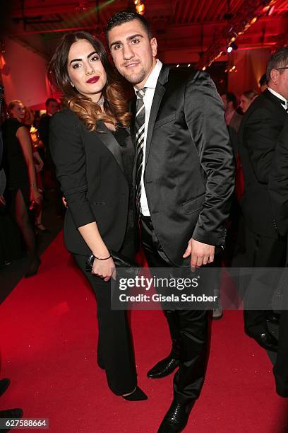 Boxer Marco Huck and his wife Amina Huck during the Ein Herz Fuer Kinder reception at Adlershof Studio on December 3, 2016 in Berlin, Germany.