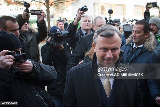 Austrian far-right Freedom Party presidential candidate Norbert Hofer arrives at a polling station to cast his ballot in Pinkafeld, Austria, December...