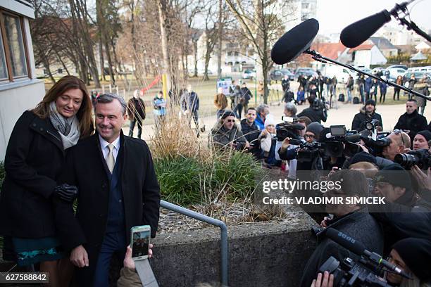 Austrian far-right Freedom Party presidential candidate Norbert Hofer and his wife Verena arrive at a polling station to cast their ballot in...