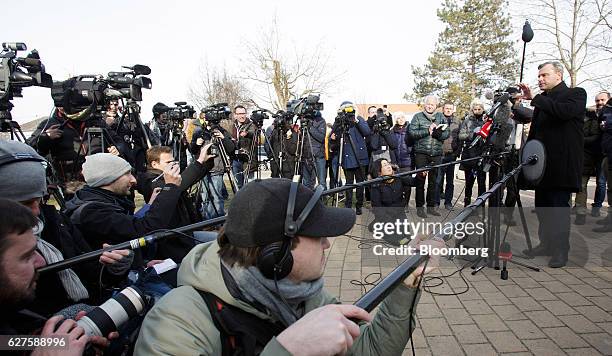 Norbert Hofer, presidential candidate of Austria's Freedom party, adresses members of the media in front of a polling station after casting his vote...