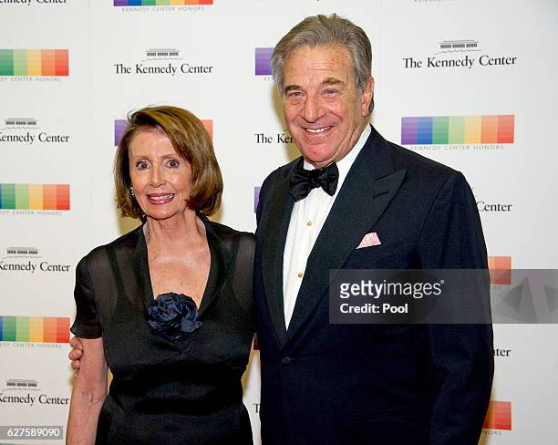 United States House Minority Leader Nancy Pelosi and her husband, Paul, arrive for the formal Artist's Dinner honoring the recipients of the 39th...