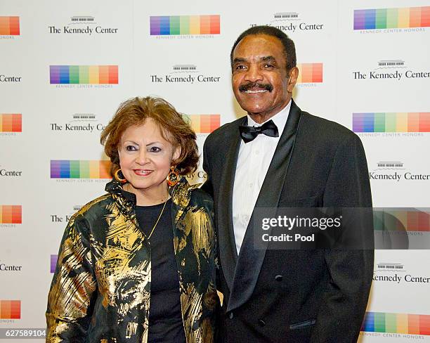 Former NFL running back Calvin Hill and his wife, Janet, arrive for the formal Artist's Dinner honoring the recipients of the 39th Annual Kennedy...