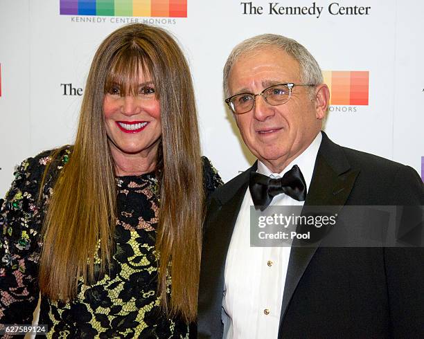 American entertainment executive and personal manager Irving Azoff, and his wife, Shirley, arrive for the formal Artist's Dinner honoring the...