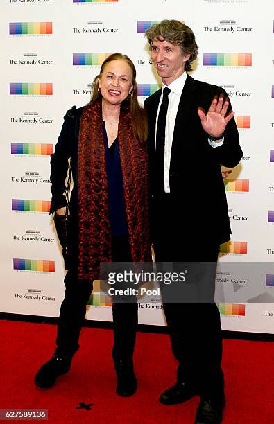 Damian Woetzel and his wife, Heather Watts, arrive for the formal Artist's Dinner honoring the recipients of the 39th Annual Kennedy Center Honors...