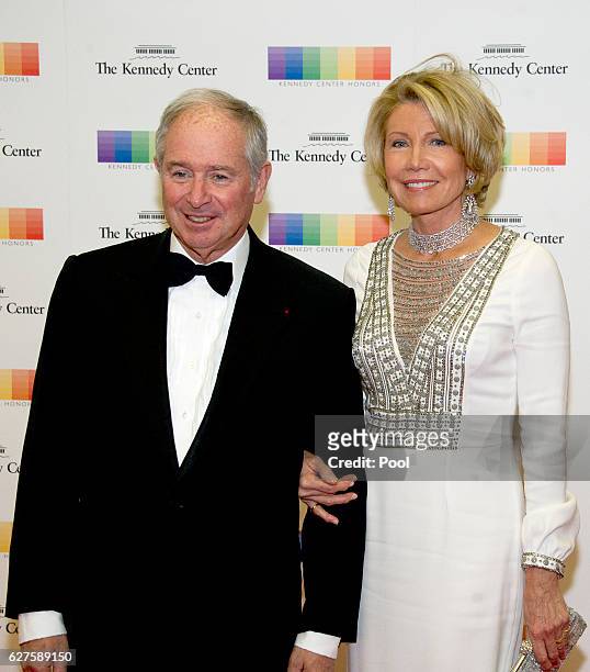 Chairman and CEO of the Blackstone Group Stephen A. Schwarzman and his wife, Christine, arrive for the formal Artist's Dinner honoring the recipients...