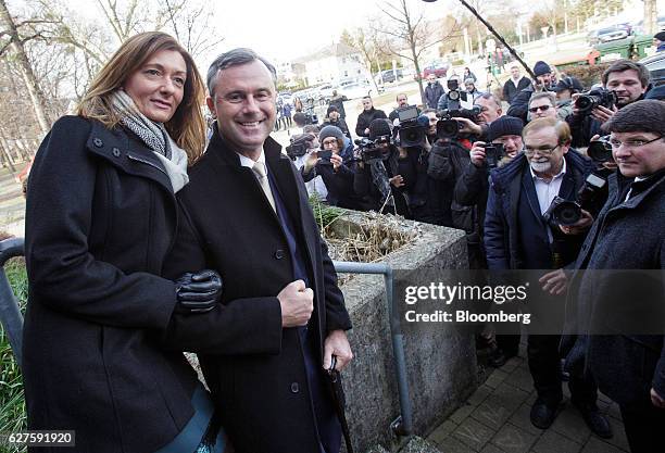 Norbert Hofer, presidential candidate of Austria's Freedom party, second from right, and his wife Verena Hofer, left, pose for the media in front of...