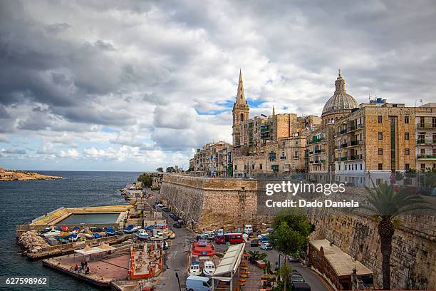 historic valletta - st julians bay stock pictures, royalty-free photos & images