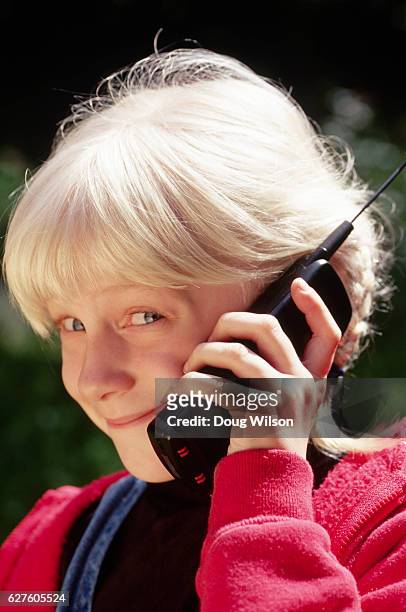 girl with cellular phone - 90s cell phone bildbanksfoton och bilder