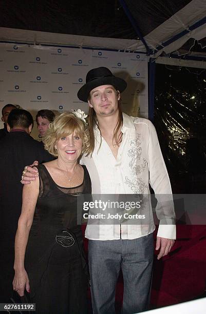 Kid Rock and his mother Susan Ritchie arrive at the Warner Brothers Grammy party.