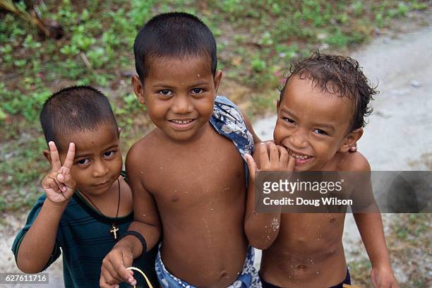 children on falalop island, micronesia - micronesia stock pictures, royalty-free photos & images