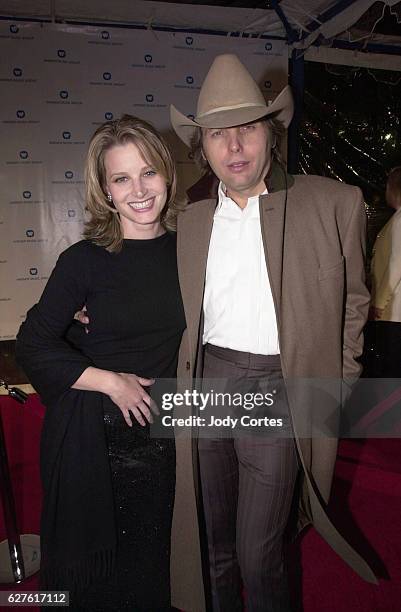 Bridget Fonda and Dwight Yoakam arrive at the Warner Brothers Grammy party.