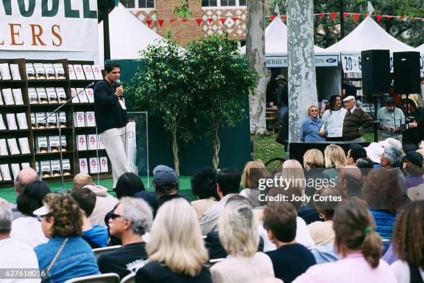 Author Deepak Chopra talks to the crowd at the Los Angeles Times Festival of Books on the Barnes & Noble stage. Deepak Chopra reads from his novel...