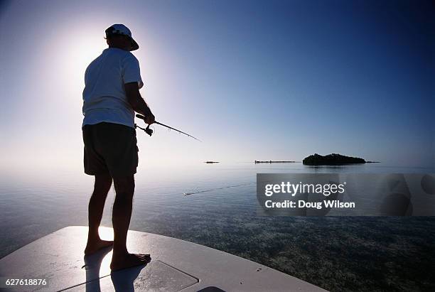 fishing for bonefish from boat's bow - bahama banks bildbanksfoton och bilder