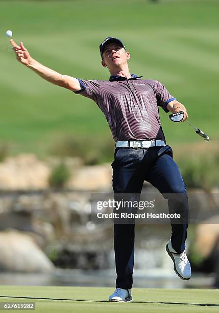 Brandon Stone of South Africa celebrates victory on the 18th green during the final round of The Alfred Dunhill Championship at Leopard Creek Country...